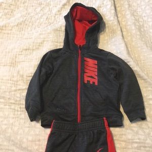 Red and gray dri-fit Nike jacket and pants